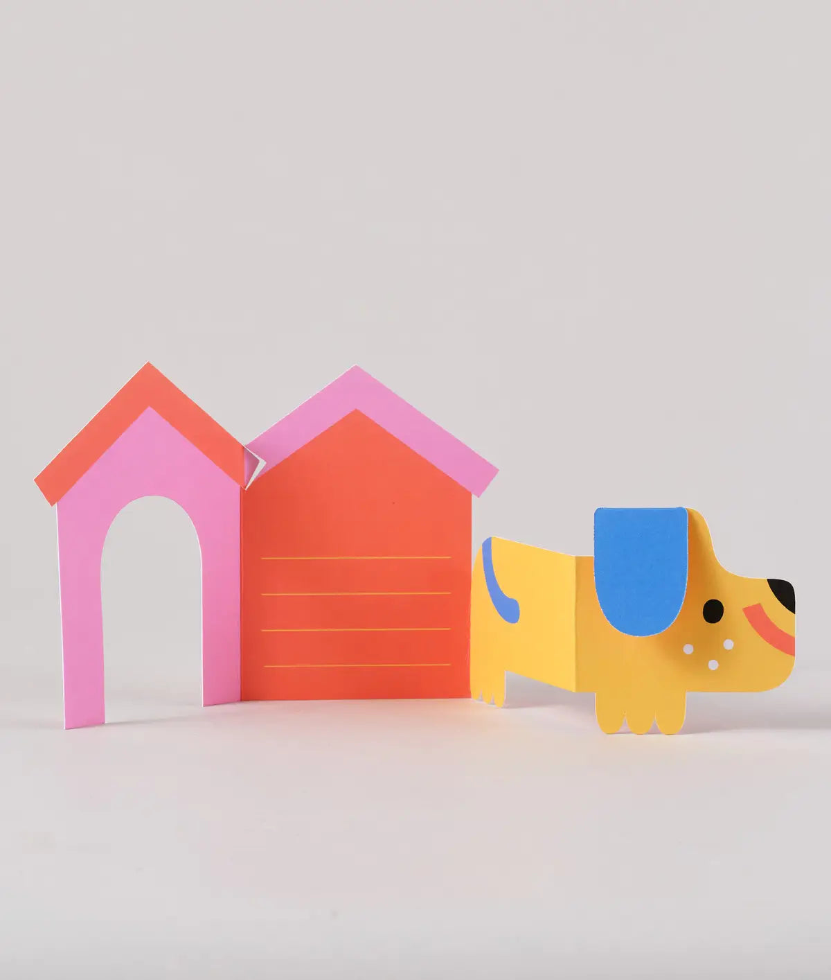 Ausklappbare Kindergeburtstagskarte „Hund im Haus“.