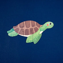 Lade das Bild in den Galerie-Viewer, Londji 7-in-1 Puzzles, Blau
