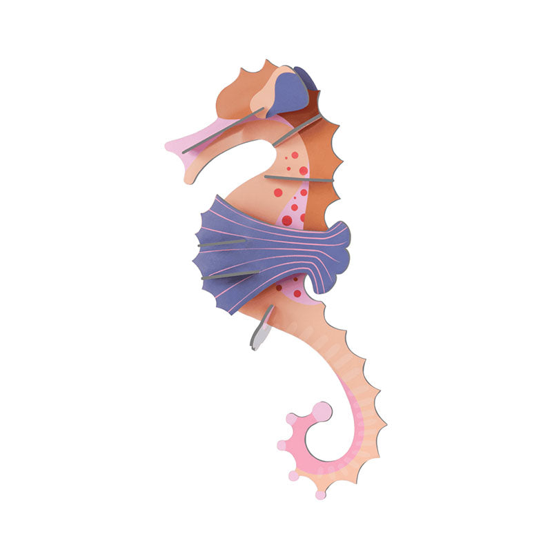 A 3D wooden seahorse puzzle model with layered wood panels in shades of orange, pink, purple, and brown.