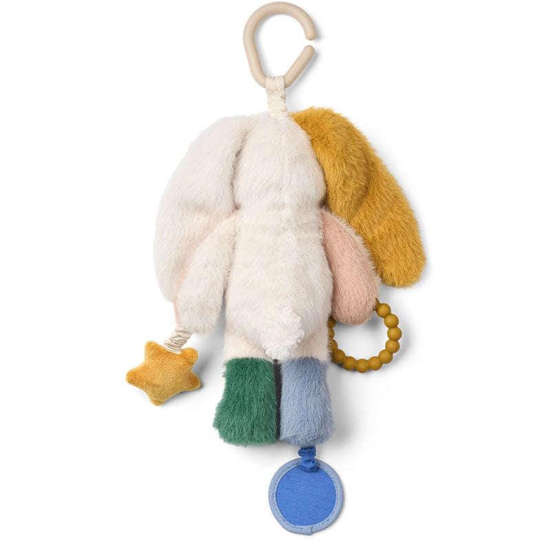 A soft plush baby toy with multiple pastel colors, including a cream bunny body